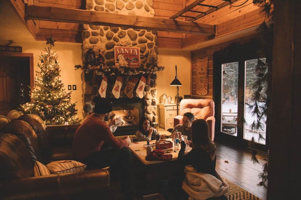 Enjoying a board game in cabin coziness.