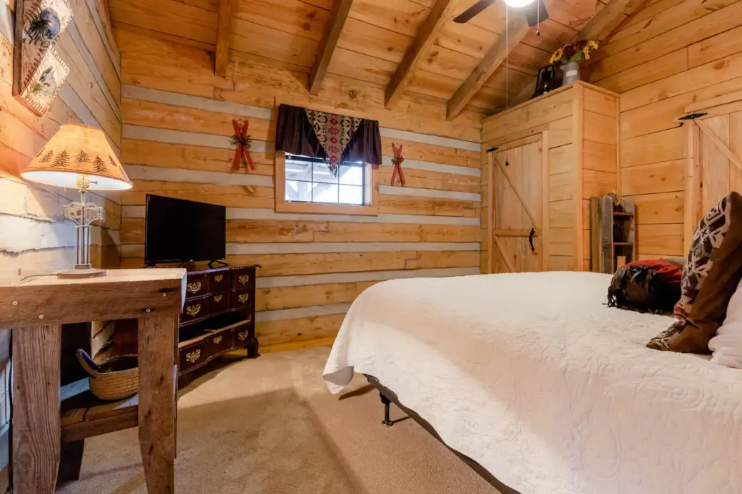 Master bedroom features brand new king size bed with brand new mattress, 40-inch Roku TV with live s
