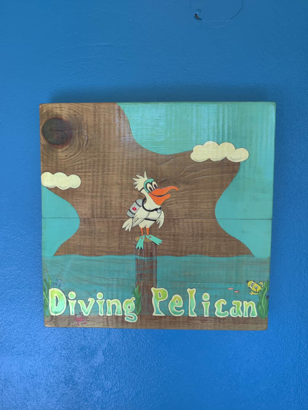 Diving Pelican sign Diving Pelican sign