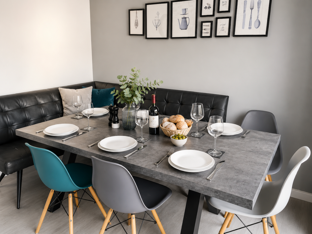Social dining space off the kitchen with seating for 10 and sliding doors to the garden