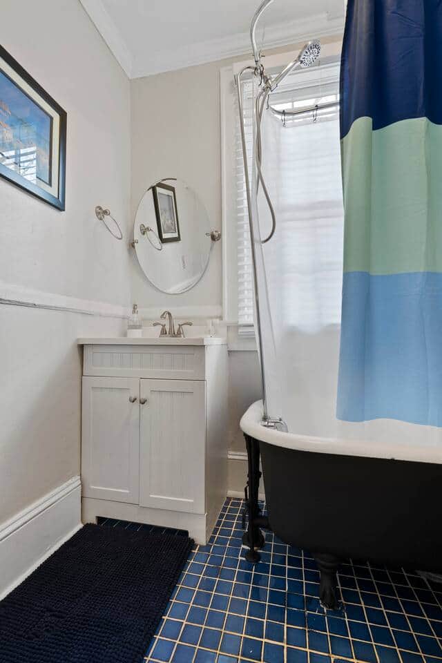 Bathroom #1 w/classic clawfoot tub with shower ring