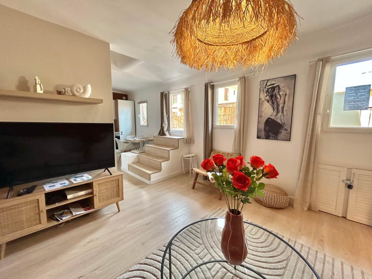 living room, TV, convertible sofa, kitchen