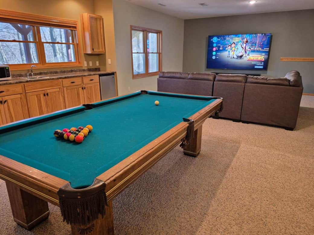 Your group will love the recreation area with 98" tv.