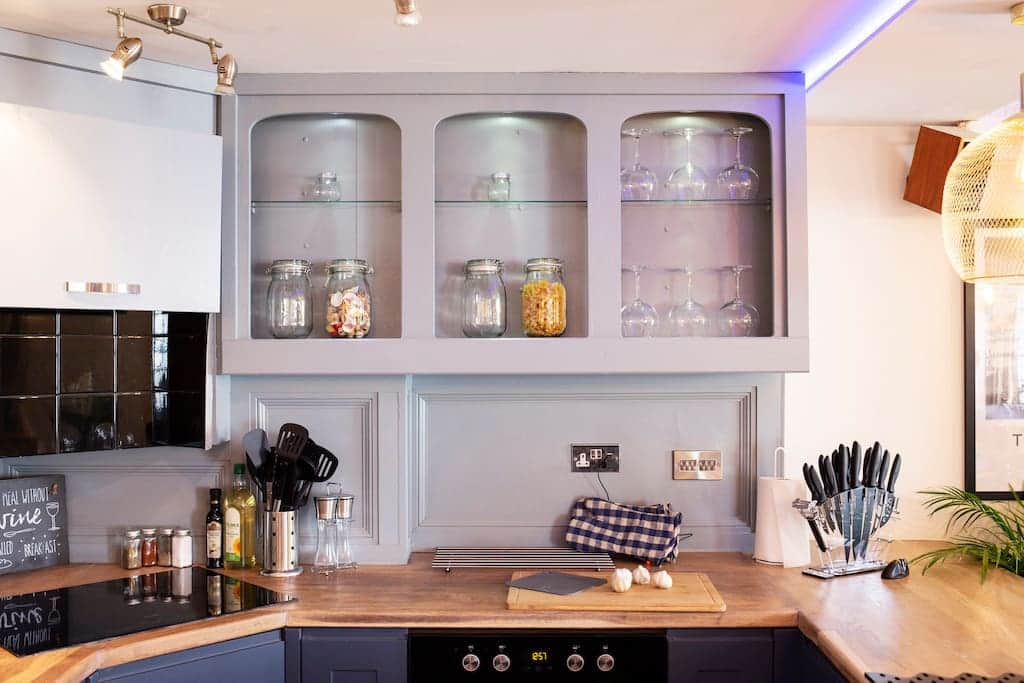 Kitchen With Modern Appliances And Utensils