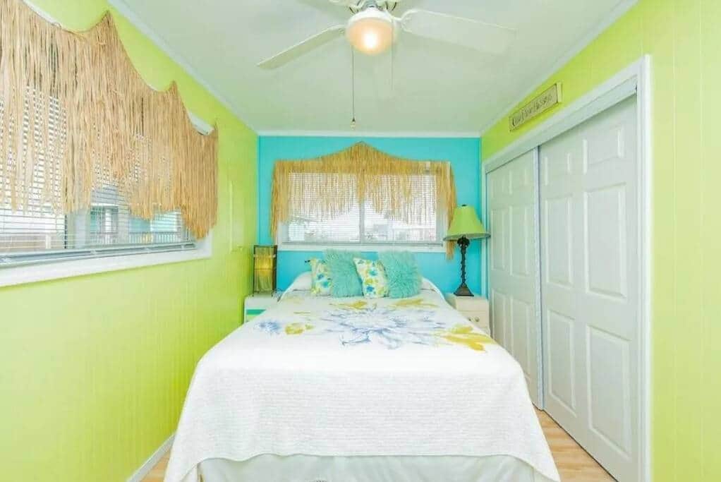2nd bedroom with queen bed, desk, and chair