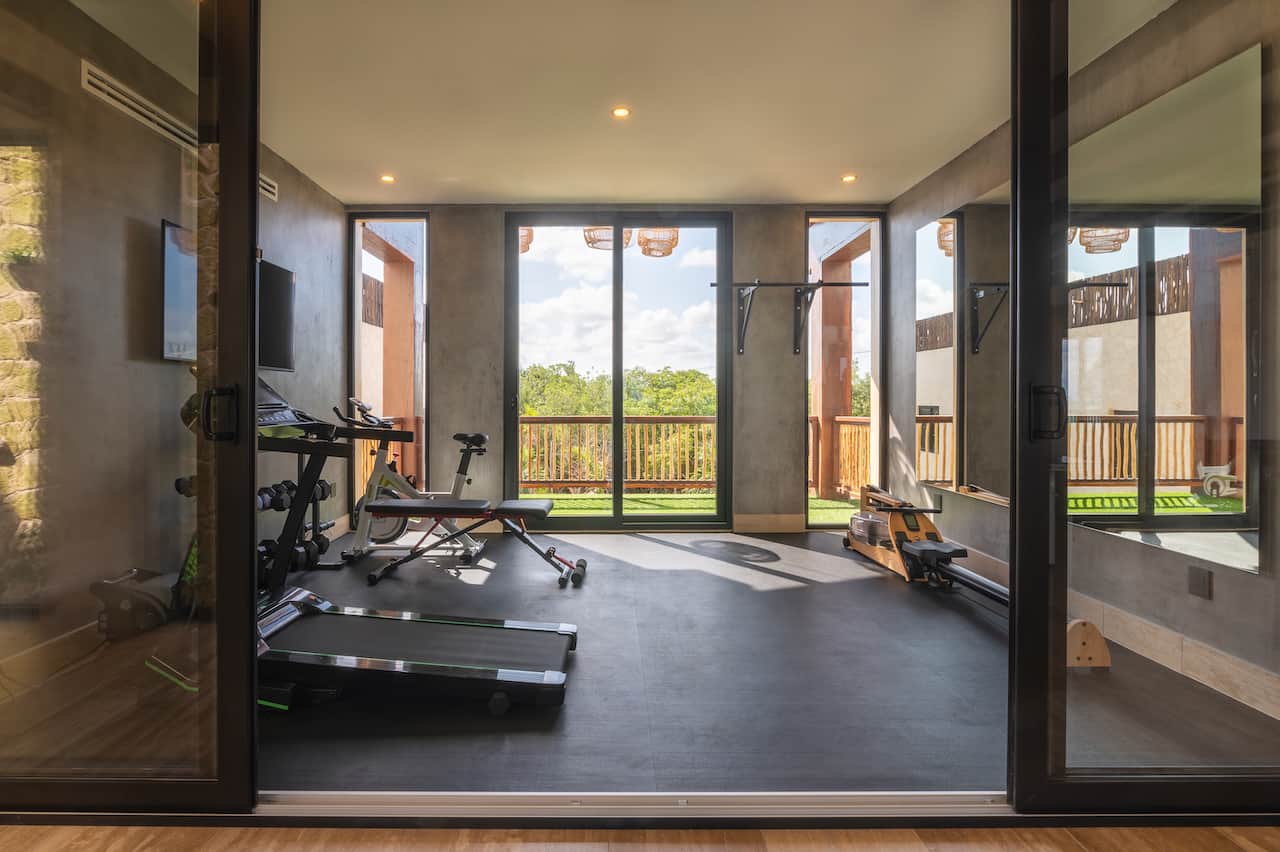 Private gym at Villa TuluMar with modern equipment