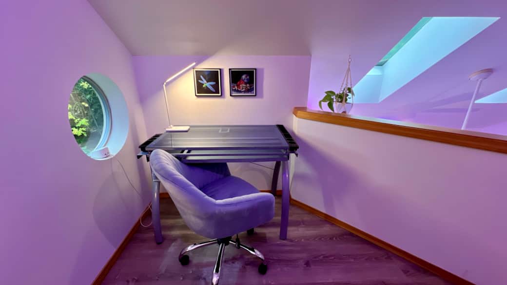 Stay productive at the dedicated workspace with fast Wi-Fi, natural light, and a unique round window