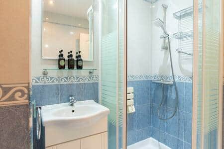Clean & Functional Bathroom with Shower Cabin Clean & Functional Bathroom with Shower Cabin