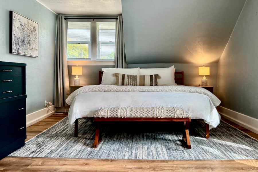 King bedroom with premium linens at Surf & Serenity House