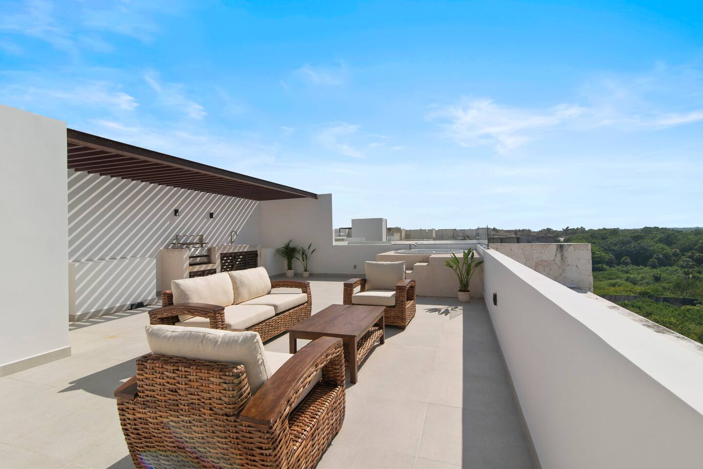 Stretch out on the comfortable outdoor lounge seating and take in breathtaking panoramic Akumal jungle views from your private rooftop terrace—the perfect place to relax with family and friends under the Caribbean sky.