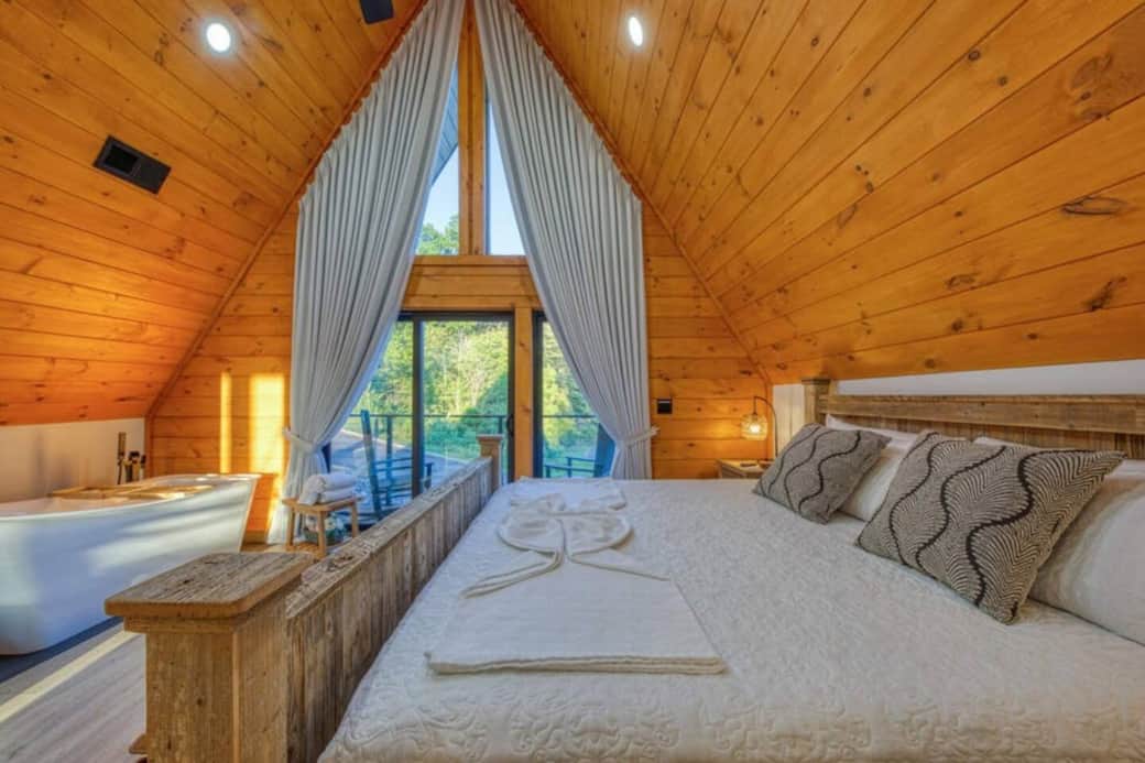 On the second floor, the spacious master suite is a true retreat: soak in the luxurious jacuzzi tub positioned to capture the sunrise through the skylights, or seclude with a book on a private balcony.