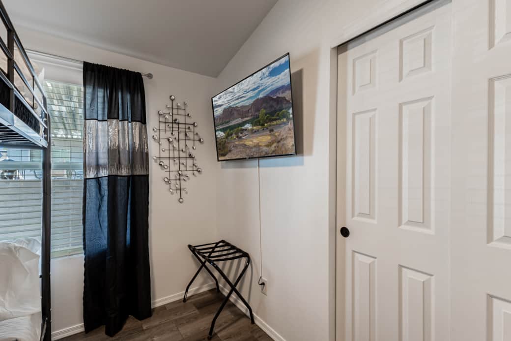 50” Smart TV, room-darkening drapes, luggage rack, and plenty of space to relax and unpack.