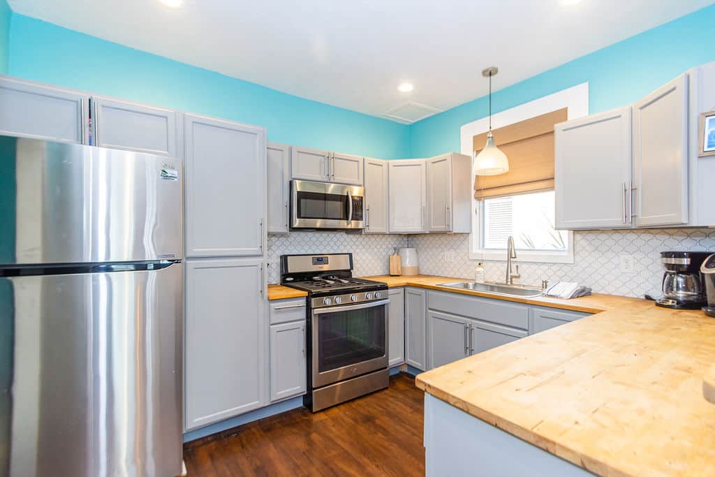 Full kitchen from dining area. Full kitchen from dining area.