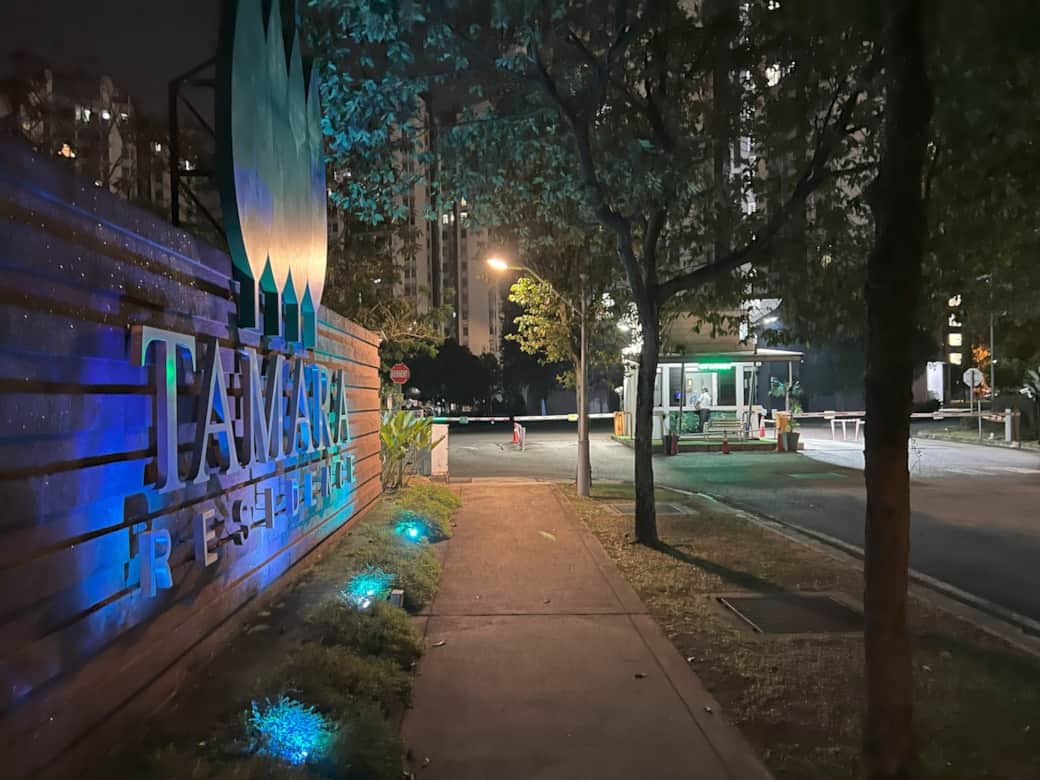 Tamara Residence entrance and guardhouse at night. Tamara Residence entrance and guardhouse at night.