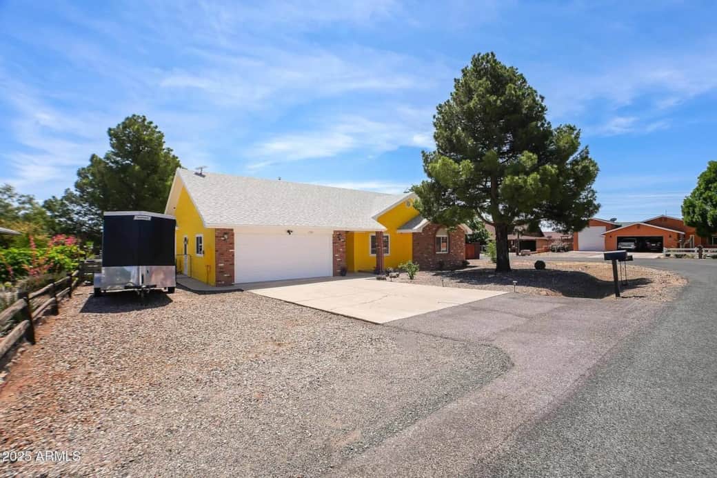 Ample parking with private driveway—perfect for multiple vehicles, trailers, or adventure gear Ample parking with private driveway—perfect for multiple vehicles, trailers, or adventure gear