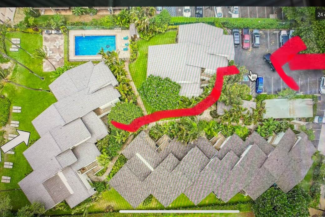 A4: Sugar Shack is a beautiful walkout unit right on the ocean!  Shows you how close you are to Beach/Ocean.  The left side of the photo is the beach, adjacent to the privacy hedge and lounge chairs.   