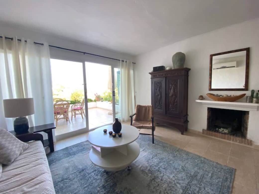 Bright living room with terrace access at Ibiza Seaview Apartment in Ibiza