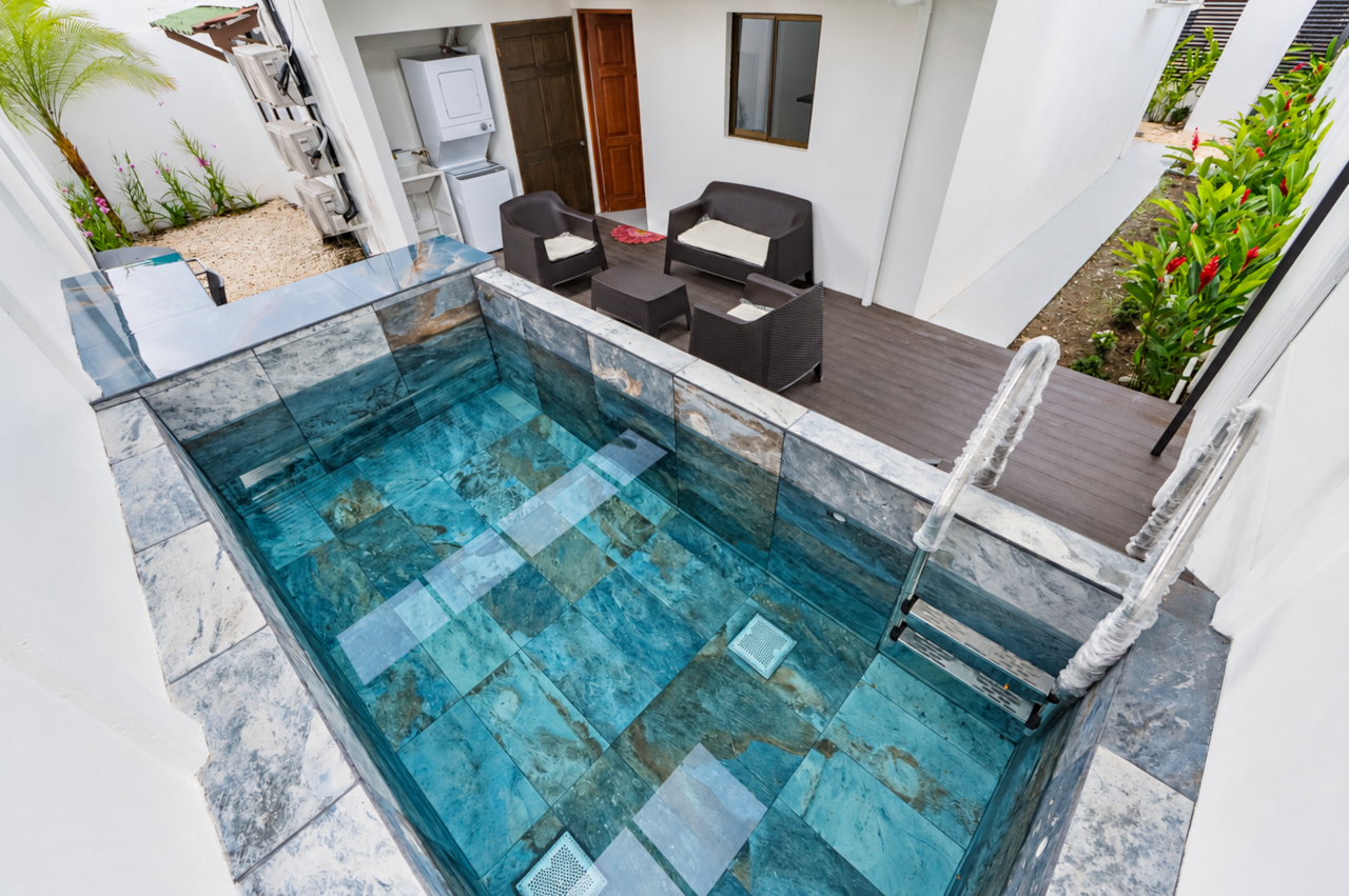 Sunlit turquoise plunge pool