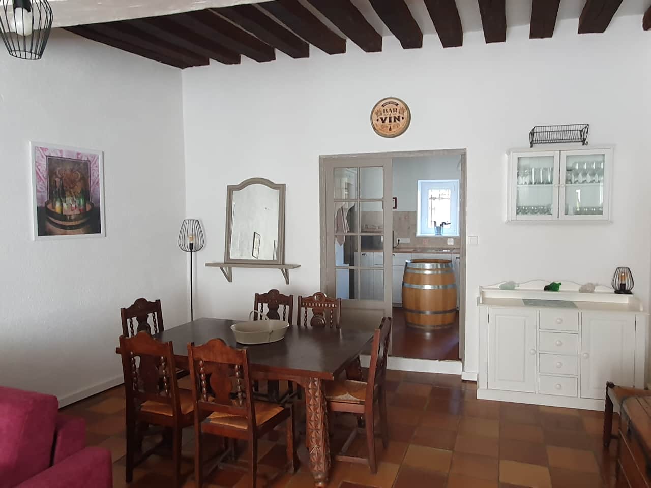 Dining area : table for 7 people and a high chair