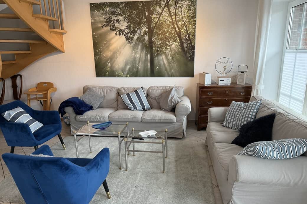 EG - Wohnbereich mit Sofa und Sesseln für gemütliche Stunden