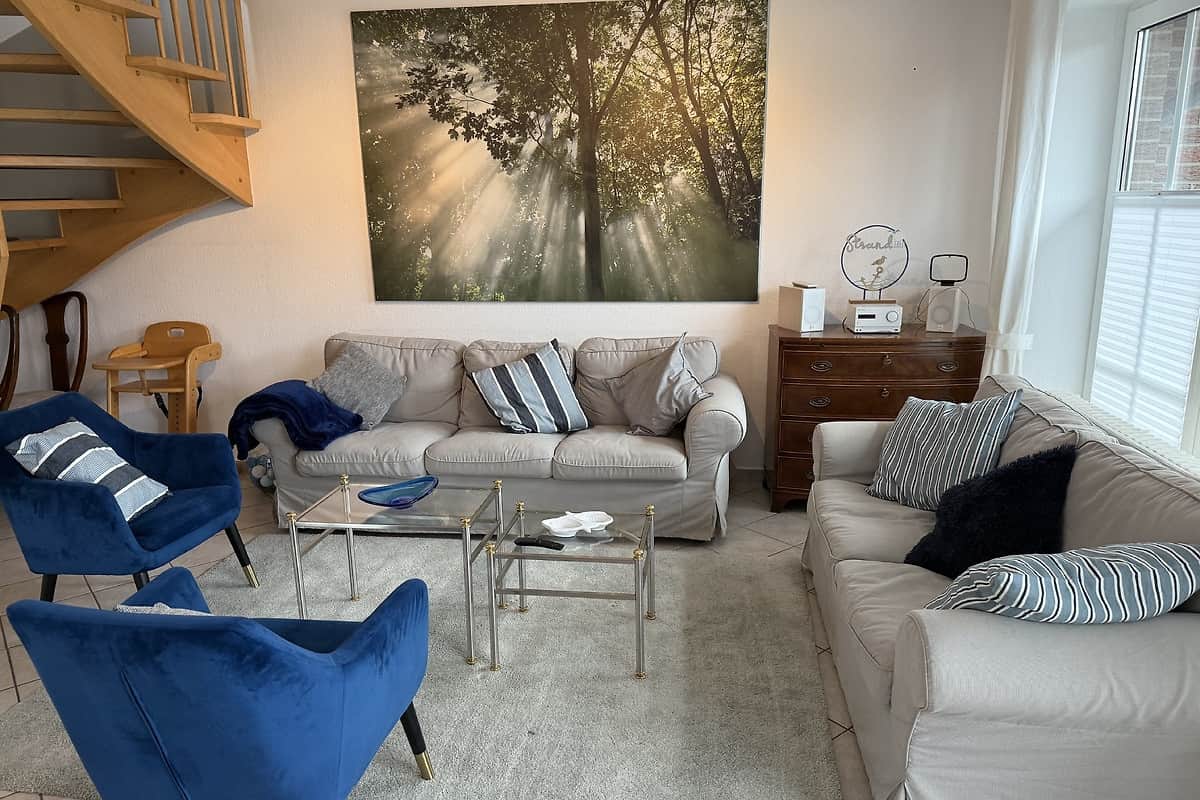 EG - Wohnbereich mit Sofa und Sesseln für gemütliche Stunden