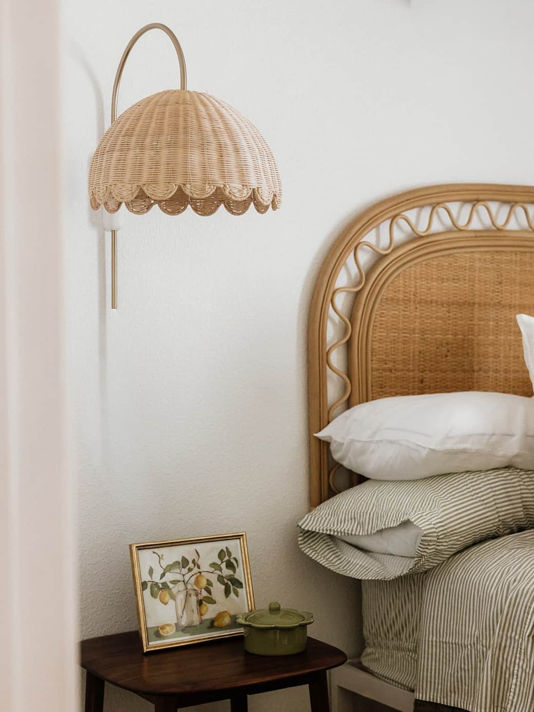 A softly styled retreat with scalloped accents throughout, from the statement lamp to curated decor. This full-size bedroom is layered with cozy linens, warm wood tones, and vintage touches, creating a space that feels relaxed, refined, and inviting.