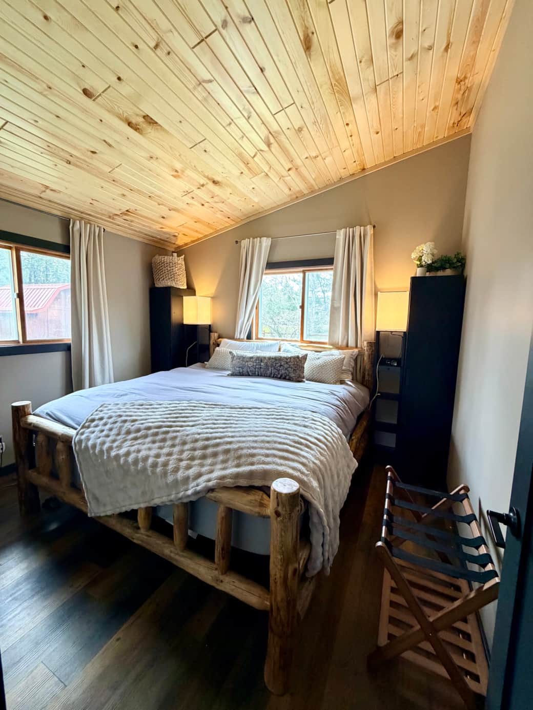 King bedroom with new knotty pine ceiling installed 