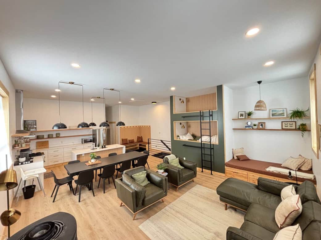 Open-concept top floor brings everyone together in a cozy and modern setting with tasteful design