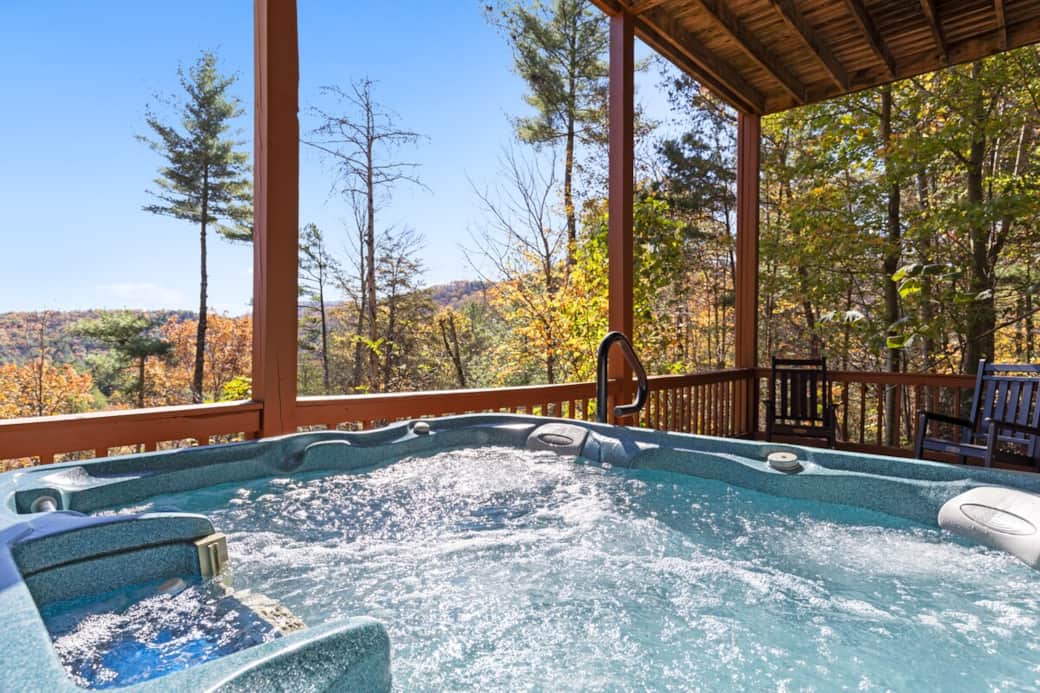 Hot tub on the lower deck with beautiful views, accessible from the game room. Comfortably seats six—perfect for relaxing after a day of adventure.