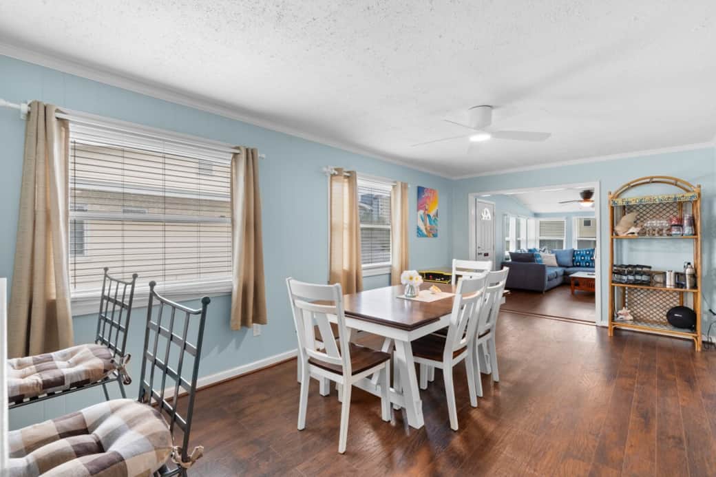 Large Dining Room Area features an EXPANDABLE Dining table to seat up to 10 ppl, breakfast bar area and a "bar" area with the tools you need to be a craft cocktail maker.  (Extra dining chairs are stored in laundry room)