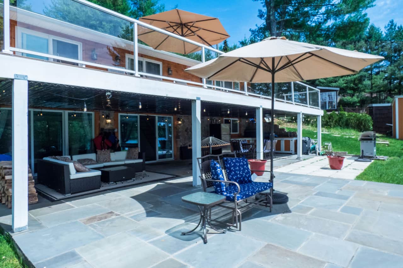 Large deck and covered patio spaces are great for entertaining.