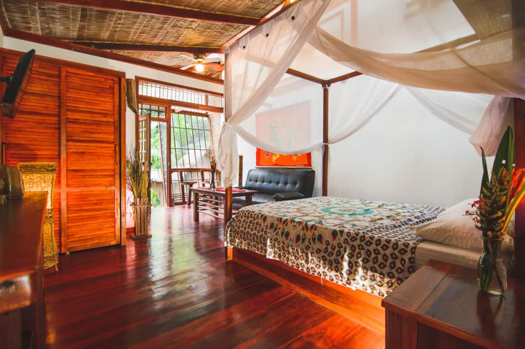 uva blue villas puerto viejo bedroom canopy bed villa 2