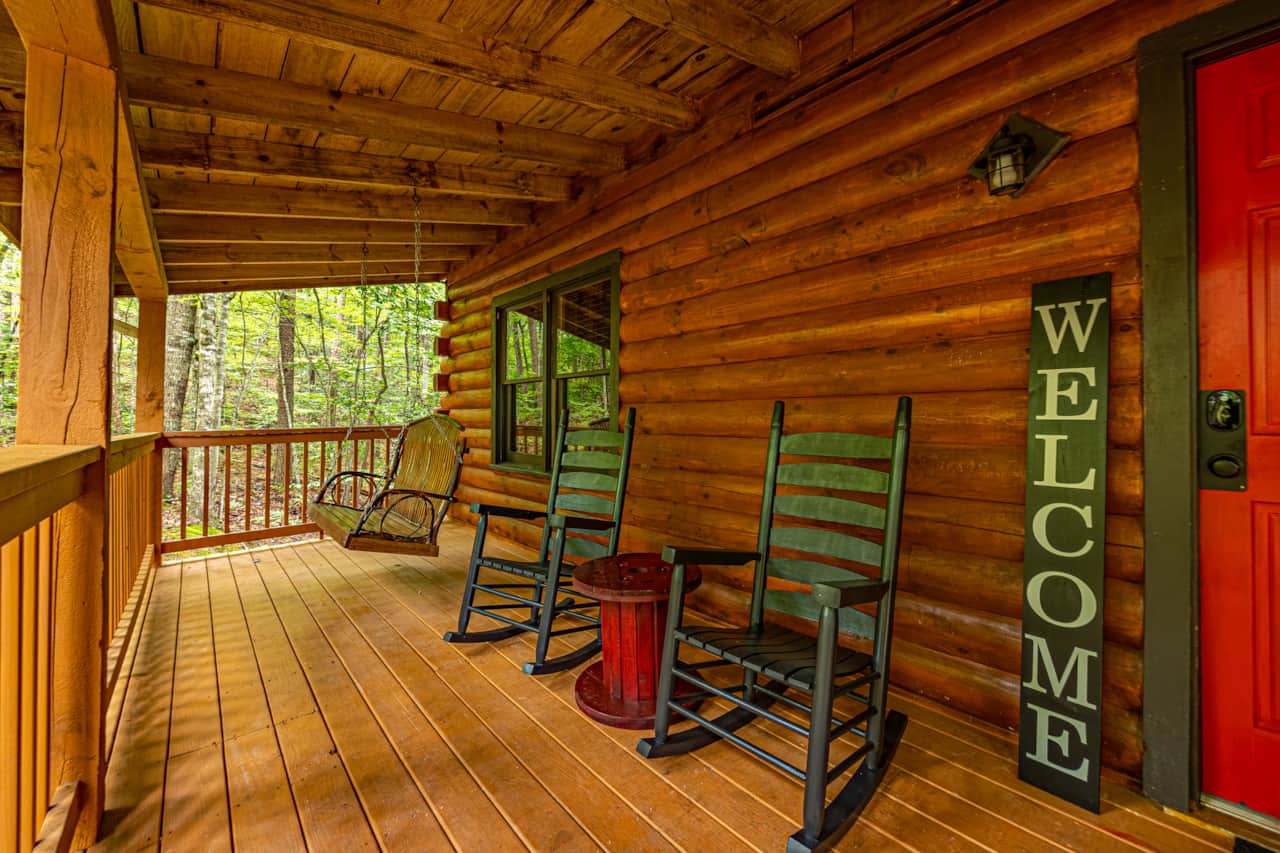 Unwind on the porch swing  or rock the evening away on the rocking chairs on the front deck