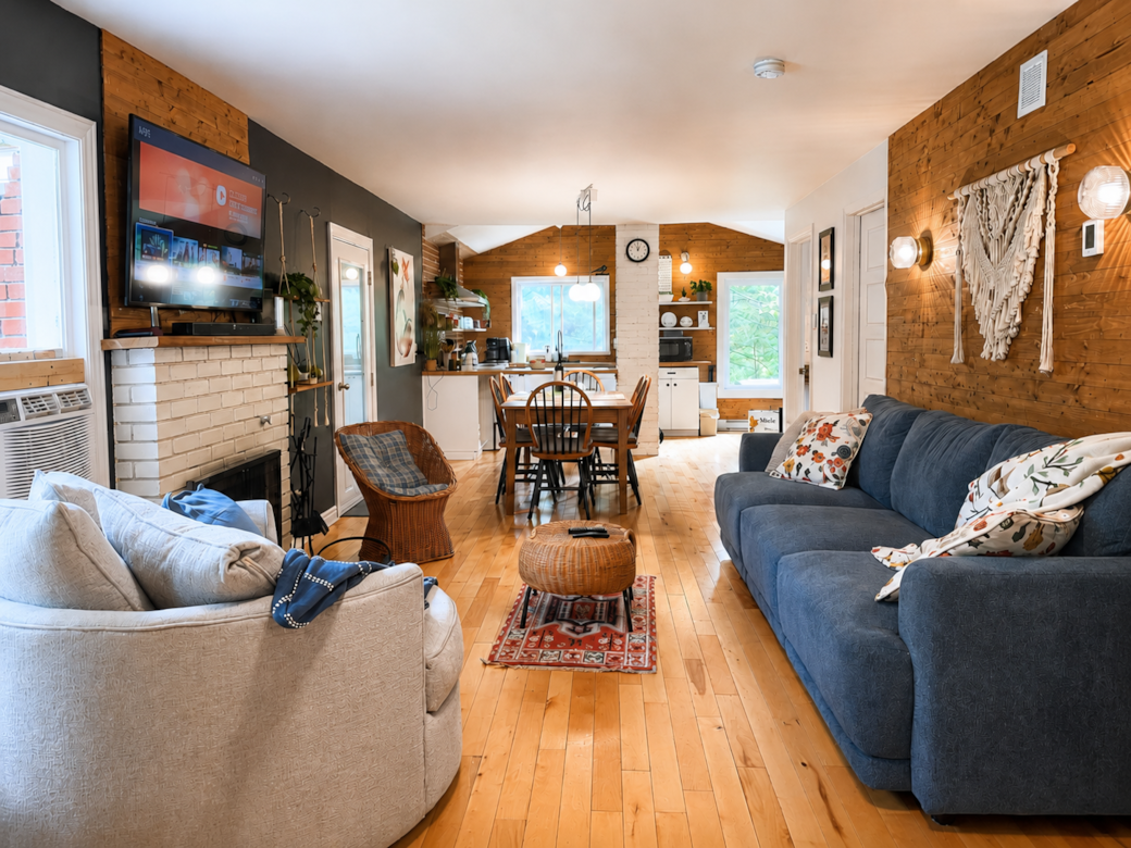 Le chickadee open concept living room dining area brebeuf