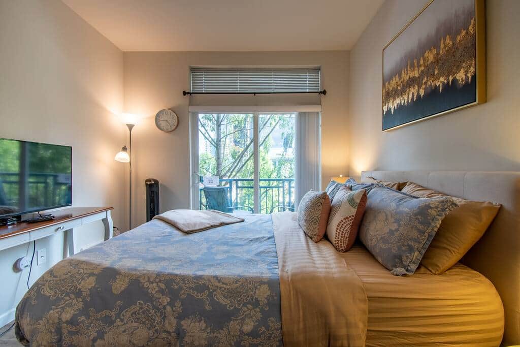 Master Bedroom with 46" Television & Private Balcony 