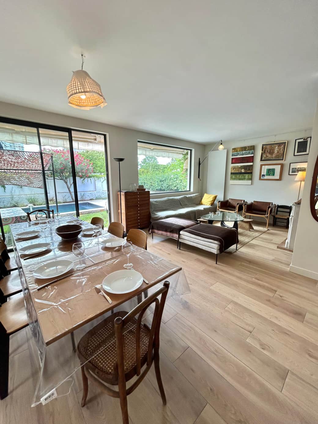 living room, dining table, TV, sofa, chairs, armchairs, view on pool