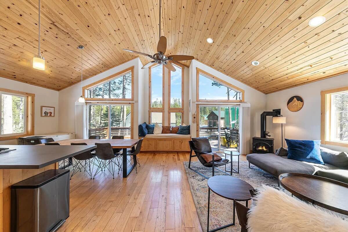 Bright vaulted living room in our Serene Lakes family cabin
