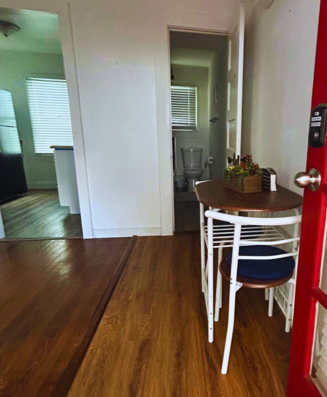 Cozy dining area for two with a charming plant centerpiece. Lakeland, FL
