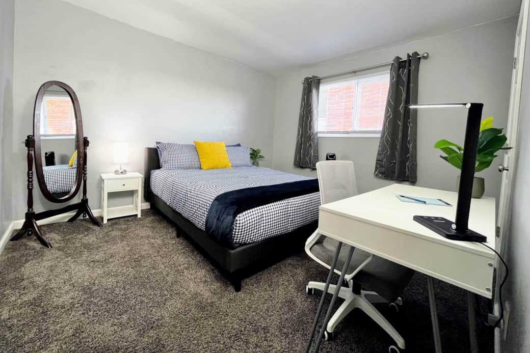 Queen size bed with two side sleeper and two back sleeper pillows