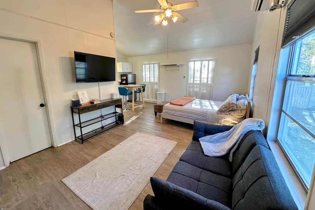 Crisp, tidy living area with 50" Roku TV Crisp, tidy living area with 50" Roku TV