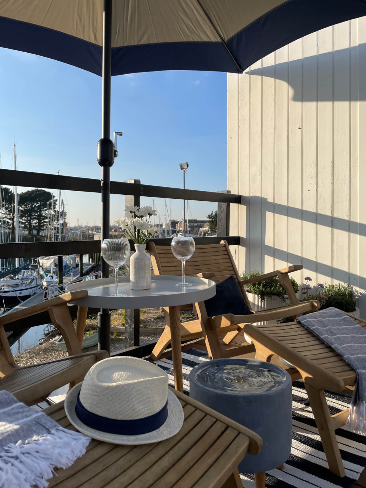 Side deck with marina and harbour views