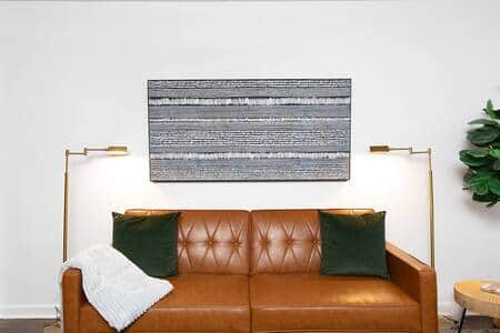 Unwind on our plush sofa, effortlessly transforming into a cozy bed for added comfort.