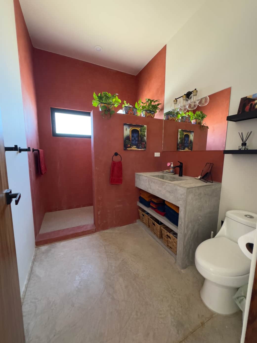 Sustainable bathroom with local hand soap and shower water reused as gray water for the garden. Sustainable bathroom with local hand soap and shower water reused as gray water for the garden.
