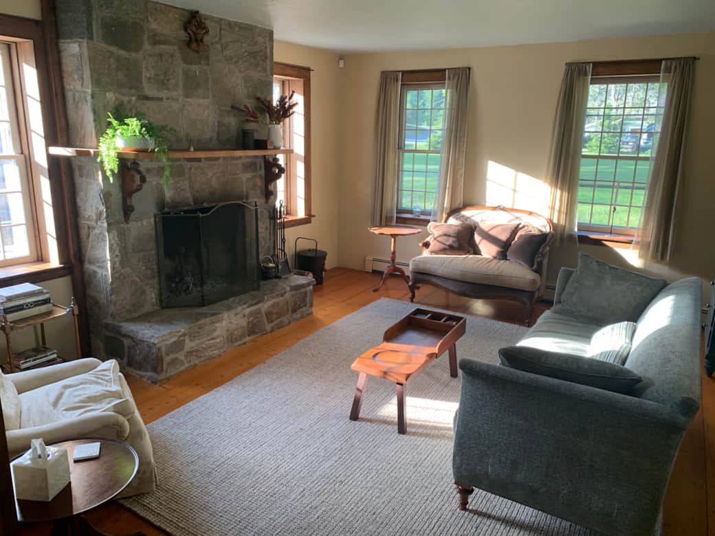 Relax and read a book in the large living room.