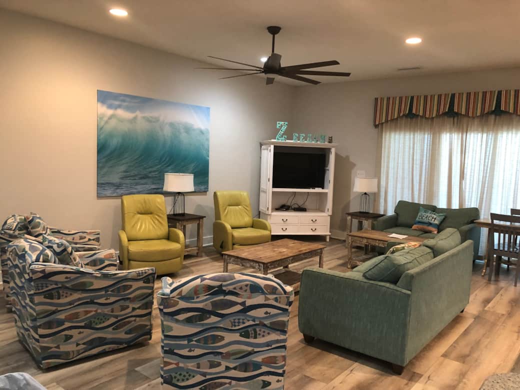 Living room with lots of seating. Open to the dining room. Living room with lots of seating. Open to the dining room.