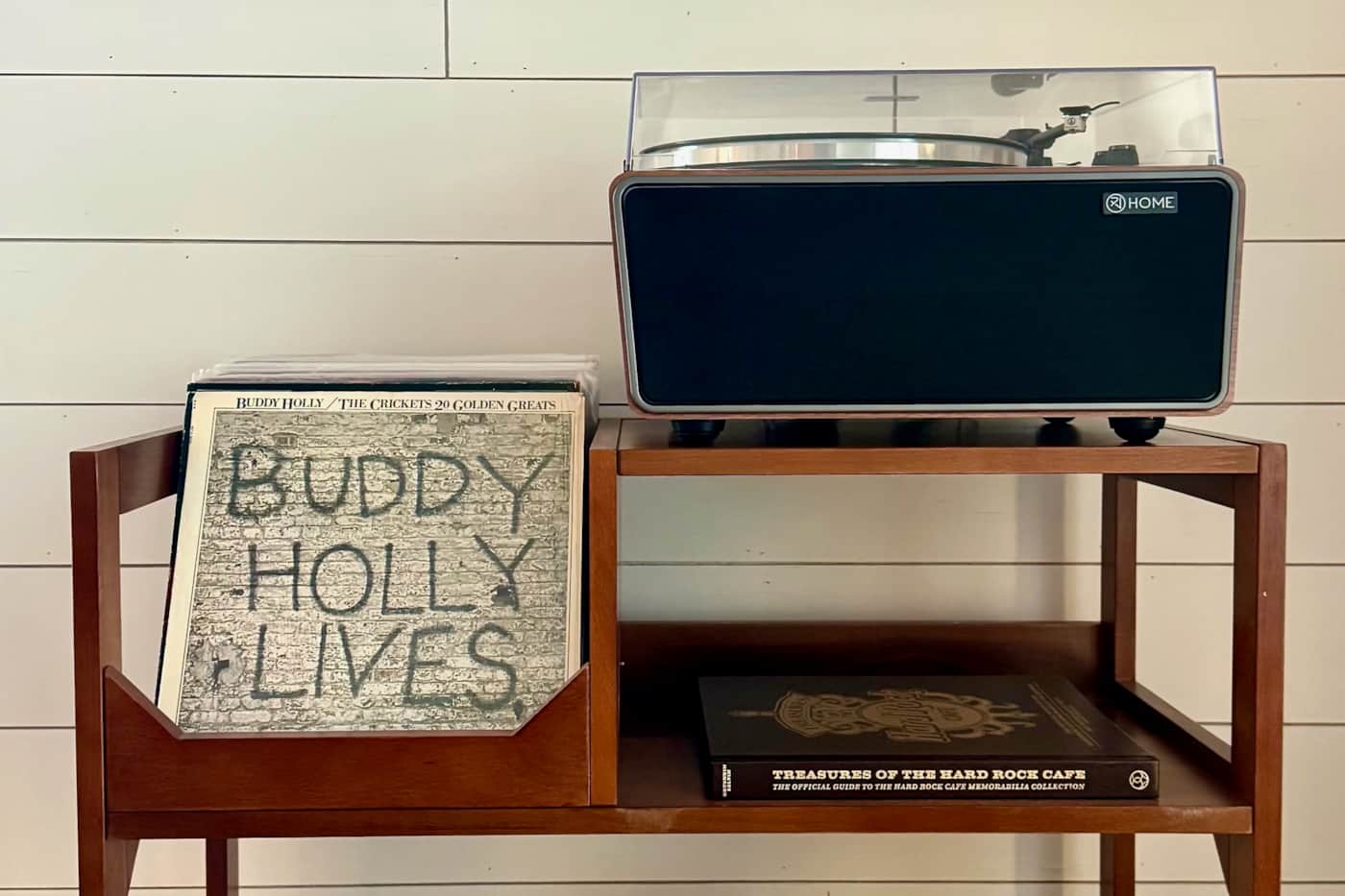 Record player and curated vinyl collection at Surf & Serenity House
