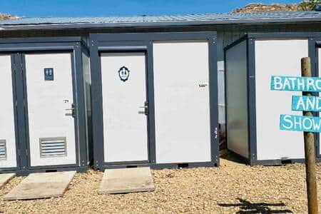 Bathrooms, flush toilets and hot showers 