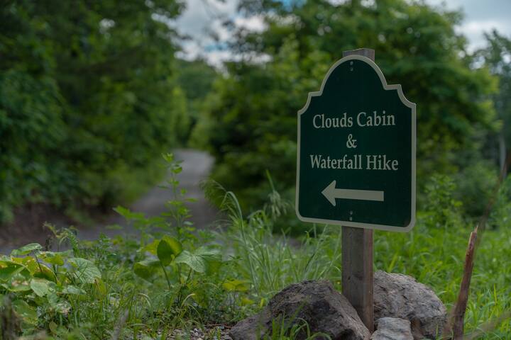 Adventure awaits - a sign at the last turn  guides you to your mountain retreat.
