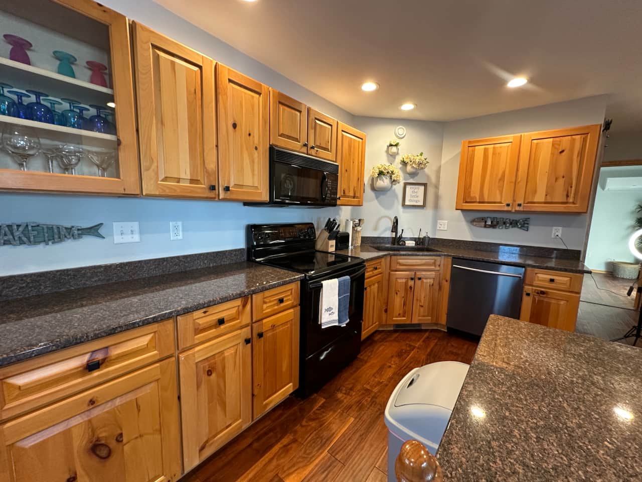 The kitchen is fully stocked with all the essentials, including modern appliances. 