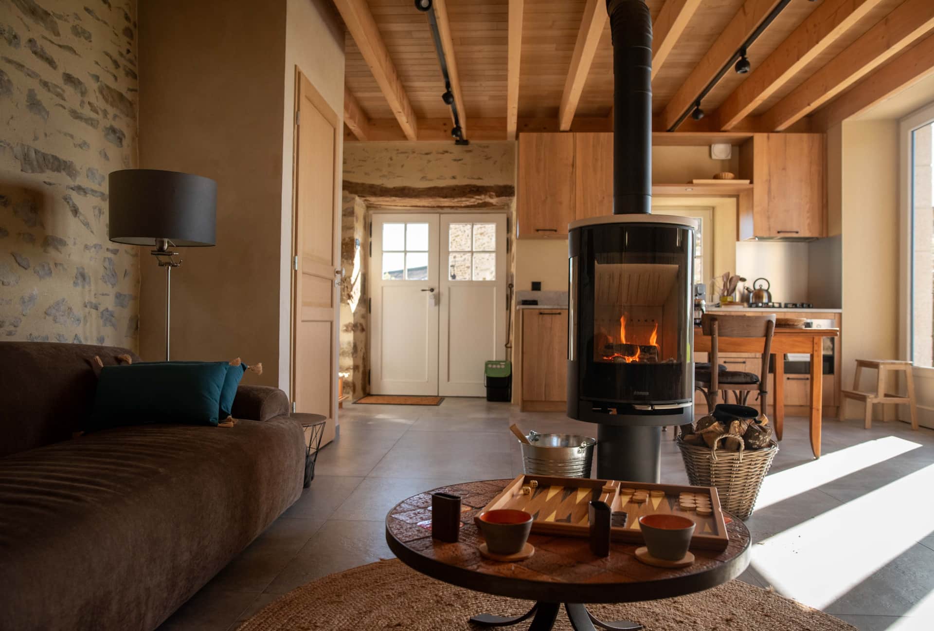 Backgammon by the fire. The cosy living room complete with wood burner.